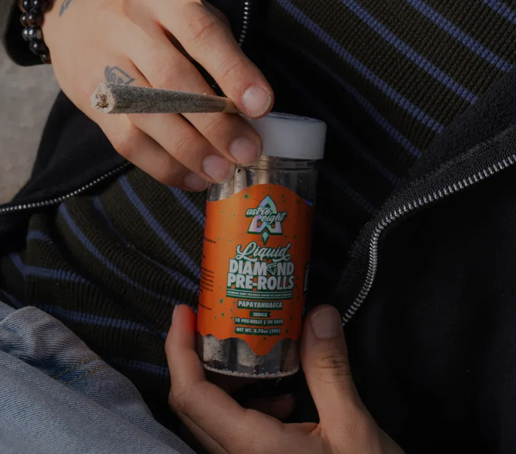 Astro Eight premium hemp pre-rolls pack displaying masterfully rolled joints alongside brand packaging.